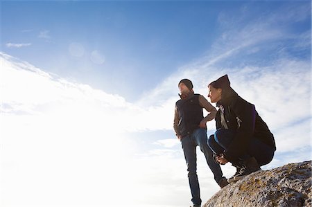 simsearch:649-07280823,k - Couple on top of rock, Connemara, Ireland Stock Photo - Premium Royalty-Free, Code: 649-08060245