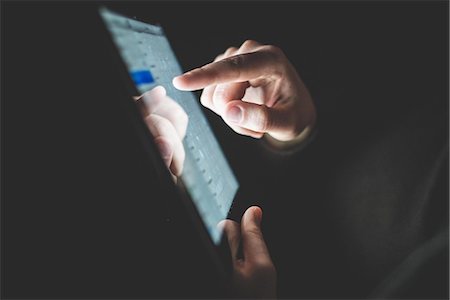 Mature man using digital tablet, focus on hands Stock Photo - Premium Royalty-Free, Code: 649-08060300