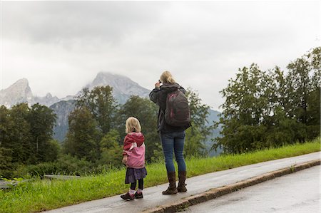 simsearch:6122-07698008,k - Rear view of mother and daughter hikers gazing at landscape from roadside, Berchtesgaden, Watzmann, Bavaria, Germany Stock Photo - Premium Royalty-Free, Code: 649-08060438