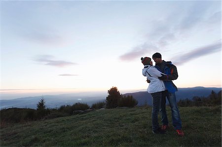 simsearch:649-07437331,k - Couple hugging on hilltop, Montseny, Barcelona, Catalonia, Spain Stock Photo - Premium Royalty-Free, Code: 649-08060495