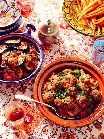 Still life of Moroccan kefta meatballs with eggplant and carrots Stock Photo - Premium Royalty-Free, Code: 649-08085422