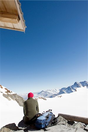 simsearch:614-06625125,k - Rear view of male hiker looking out at landscape from viewing platform, Jungfrauchjoch, Grindelwald, Switzerland Stock Photo - Premium Royalty-Free, Code: 649-08085707