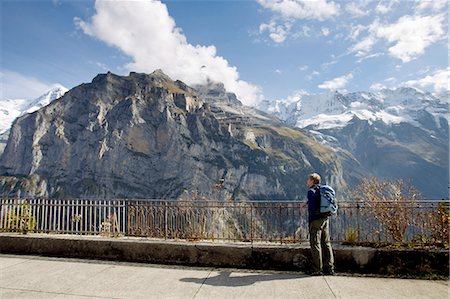 simsearch:649-08085723,k - Male hiker gazing toward Nordwand of Mount Eiger, Murren, Grindelwald, Switzerland Foto de stock - Sin royalties Premium, Código: 649-08085715