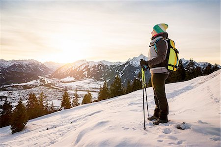 simsearch:614-06625125,k - Young female hiker looking out from mountainside, Reutte, Tyrol, Austria Stock Photo - Premium Royalty-Free, Code: 649-08086387