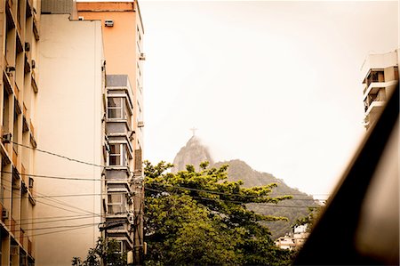 Low angle view of misty Christ the Redeemer, Rio De Janeiro, Brazil Stock Photo - Premium Royalty-Free, Code: 649-08118541