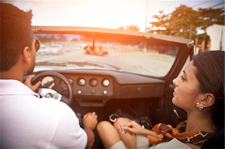 Mid adult couple in convertible car, rear view Stock Photo - Premium Royalty-Free, Code: 649-08125033