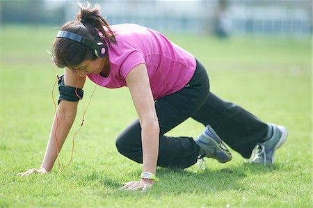 simsearch:853-03616708,k - Mature woman doing exercises in park Stock Photo - Premium Royalty-Free, Code: 649-08144362