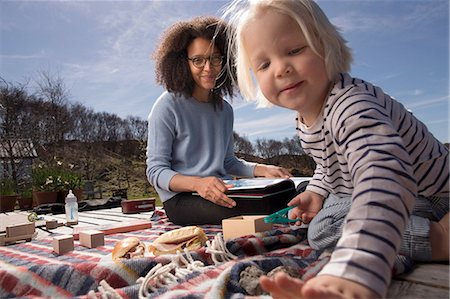 Mother and son on picnic blanket Stock Photo - Premium Royalty-Free, Code: 649-08144453