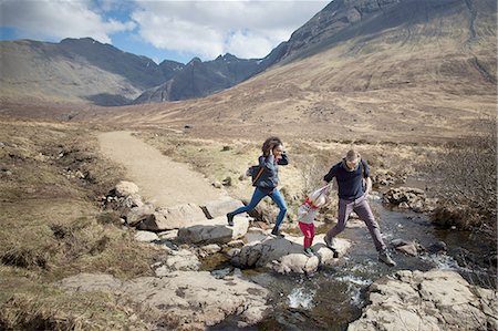 skye scotland - Family crossing stream, Fairy Pools, Isle of Skye, Hebrides, Scotland Stock Photo - Premium Royalty-Free, Code: 649-08144556