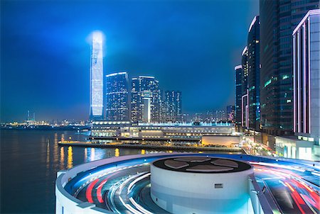 financial district in asia - Kowloon business district: skyline with ICC building and cruise terminal at night, Hong Kong, China Stock Photo - Premium Royalty-Free, Code: 649-08145404