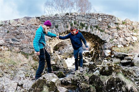 simsearch:649-08239088,k - Young couple hiking, Ashness Bridge, Keswick, Lake District, Cumbria, United Kingdom Stock Photo - Premium Royalty-Free, Code: 649-08180000