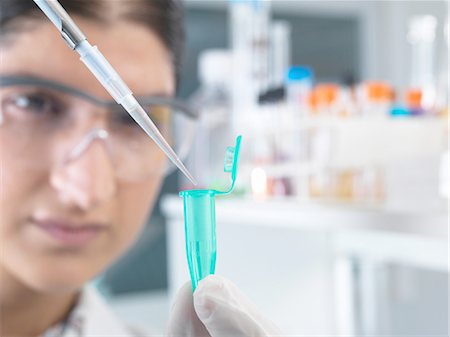 eye dropper - Female scientist pippetting sample into eppendorf tube for analysis in laboratory Stock Photo - Premium Royalty-Free, Code: 649-08180610