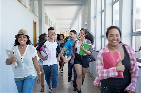 Students running down hallway, laughing Stock Photo - Premium Royalty-Free, Code: 649-08238297