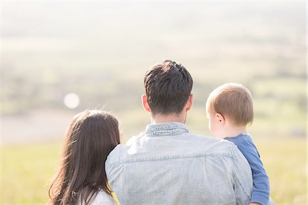 simsearch:649-07437107,k - Young family looking at rural view, rear view Stock Photo - Premium Royalty-Free, Code: 649-08232511