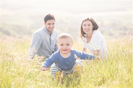 simsearch:649-07437107,k - Portrait of young family in field Stock Photo - Premium Royalty-Free, Code: 649-08232513