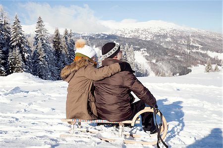simsearch:649-07438003,k - Snow capped mountains and rear view of senior couple sitting on sledge looking away, Sattelbergalm, Tyrol, Austria Stock Photo - Premium Royalty-Free, Code: 649-08306449