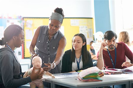 Lecturer speaking to college students in Childcare class Stock Photo - Premium Royalty-Free, Code: 649-08306519