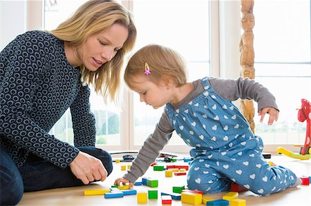 simsearch:649-07064267,k - Female toddler and mother playing with building bricks on living room floor Stock Photo - Premium Royalty-Free, Code: 649-08307465
