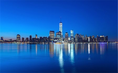 Manhattan financial district skyline and One World Trade Centre at night, New York, USA Stock Photo - Premium Royalty-Free, Code: 649-08328546