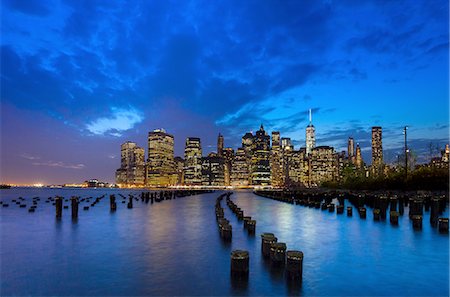 Manhattan financial district skyline and One World Trade Centre at dusk, New York, USA Stock Photo - Premium Royalty-Free, Code: 649-08328548