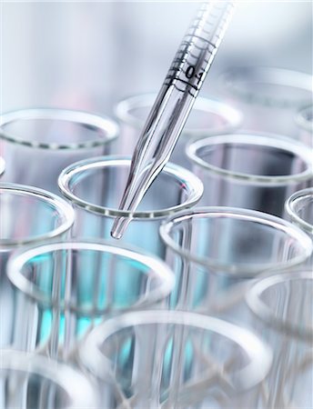 simsearch:649-07279795,k - Graduated pipette pipetting liquid into test tube Stock Photo - Premium Royalty-Free, Code: 649-08381847