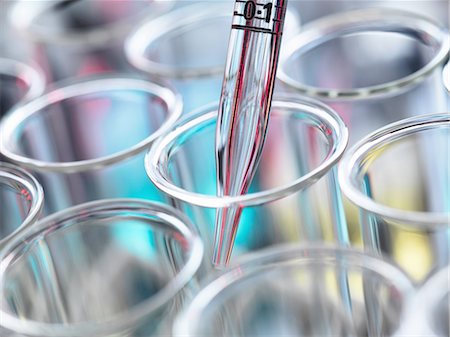 simsearch:649-07279795,k - High angle cropped view of graduated pipette pipetting liquid into test tubes Stock Photo - Premium Royalty-Free, Code: 649-08381842