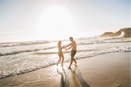 simsearch:649-07585546,k - Mid adult couple playing in sea, Cape Town, South Africa Stock Photo - Premium Royalty-Free, Code: 649-08544019