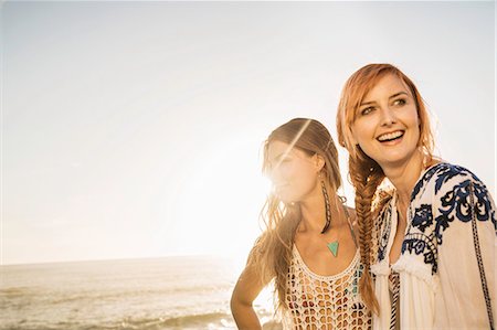 Two mid adult women on sunlit beach, Cape Town, South Africa Stock Photo - Premium Royalty-Free, Code: 649-08544029