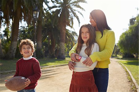 simsearch:693-06013834,k - Mother, daughter and son in park Stock Photo - Premium Royalty-Free, Code: 649-08544328