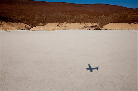 shadow plane - Shadow of aeroplane over Lake Assal, Djibouti, Africa Stock Photo - Premium Royalty-Free, Code: 649-08565478