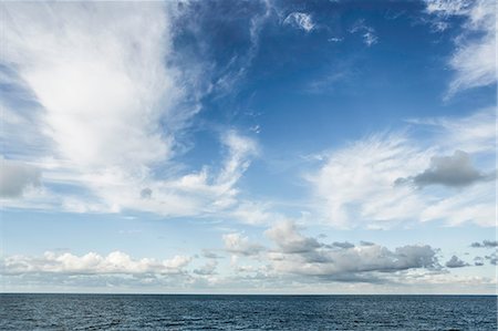 simsearch:633-06322603,k - Sea and blue sky with clouds Stock Photo - Premium Royalty-Free, Code: 649-08565658