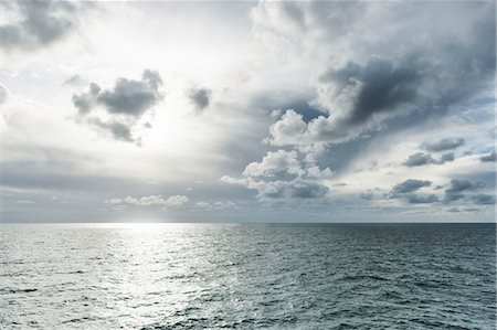 still clouds - Grey sea and clouds with sunlight Stock Photo - Premium Royalty-Free, Code: 649-08565659