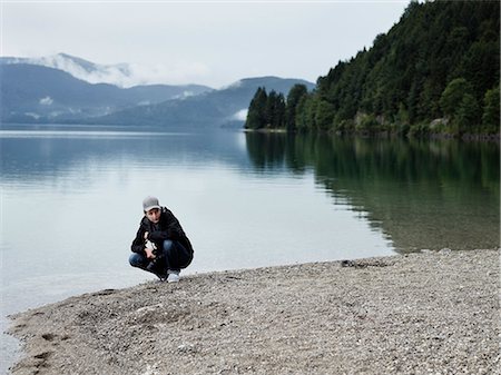 simsearch:649-03775589,k - Hiker resting by still lake Stock Photo - Premium Royalty-Free, Code: 649-08561218