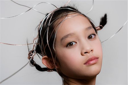 simsearch:693-06435933,k - Teenage girl with ribbons in hair Stock Photo - Premium Royalty-Free, Code: 649-08562167