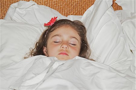 simsearch:649-07521015,k - Girl sleeping in white bedding Stock Photo - Premium Royalty-Free, Code: 649-08562284