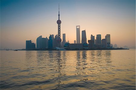 pudong - Silhouette of city skyline on river Stock Photo - Premium Royalty-Free, Code: 649-08632319