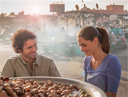 djemaa el fna food - Young couple at food stall in market, Jemaa el-Fnaa Square, Marrakesh, Morocco Stock Photo - Premium Royalty-Free, Code: 649-08662284