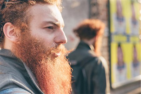 simsearch:649-08702620,k - Young male hipster twins with red hair and beards on city street Stock Photo - Premium Royalty-Free, Code: 649-08702649