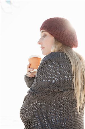 simsearch:649-07279678,k - Young woman holding cup of coffee on cold day Stock Photo - Premium Royalty-Free, Code: 649-08702971