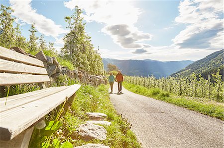 simsearch:614-06897731,k - Mature couple hiking along country road, Meran, South Tyrol, Italy Stock Photo - Premium Royalty-Free, Code: 649-08714050