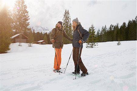 snow shoe - Couple snowshoeing across snowy landscape, Elmau, Bavaria, Germany Stock Photo - Premium Royalty-Free, Code: 649-08714382