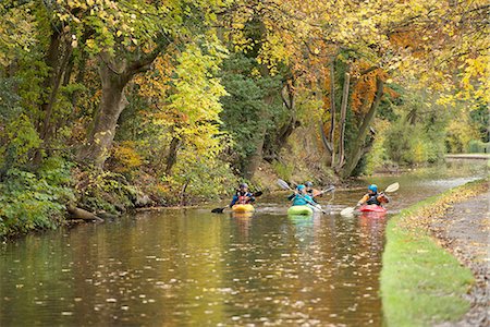 Four kayakers paddling on River Dee, Llangollen, North Wales Stock Photo - Premium Royalty-Free, Code: 649-08765906