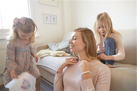 simsearch:649-07805043,k - Girl putting necklace onto mother in living room Stock Photo - Premium Royalty-Free, Code: 649-08766243
