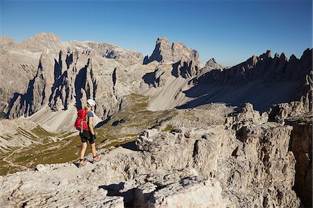 simsearch:649-08900720,k - Female hiker hiking up Dolomites, Sexten, South Tyrol, Italy Stock Photo - Premium Royalty-Free, Code: 649-08766289