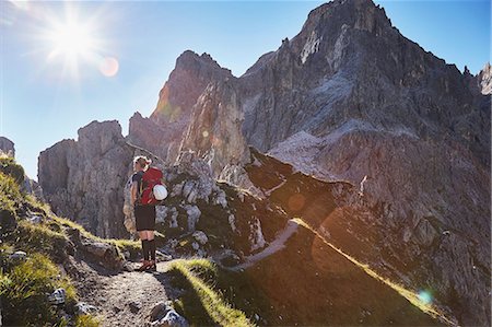 simsearch:649-08900720,k - Rear view of female hiker hiking in Dolomites, Sexten, South Tyrol, Italy Stock Photo - Premium Royalty-Free, Code: 649-08766282