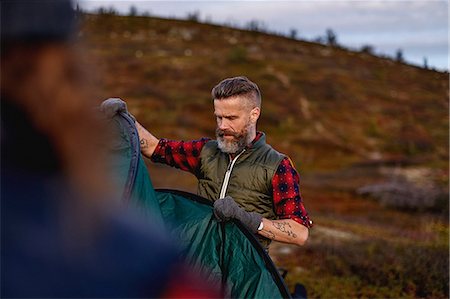simsearch:614-07239972,k - Hikers setting up tent, Keimiotunturi, Lapland, Finland Stock Photo - Premium Royalty-Free, Code: 649-08766384