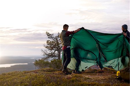 simsearch:614-08119553,k - Hikers setting up tent on hilltop, Keimiotunturi, Lapland, Finland Stock Photo - Premium Royalty-Free, Code: 649-08766383