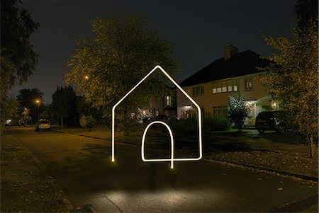 suburban house exterior not people - Illuminated house symbol Stock Photo - Premium Royalty-Free, Code: 649-08825063