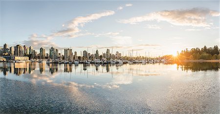 Marina and city skyline at sunset, Vancouver, Canada Stock Photo - Premium Royalty-Free, Code: 649-08825227