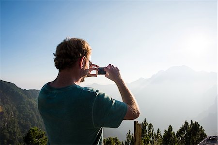 simsearch:649-07760822,k - Rear view of man taking photograph of mountains, Passo Maniva, Italy Stock Photo - Premium Royalty-Free, Code: 649-08823985